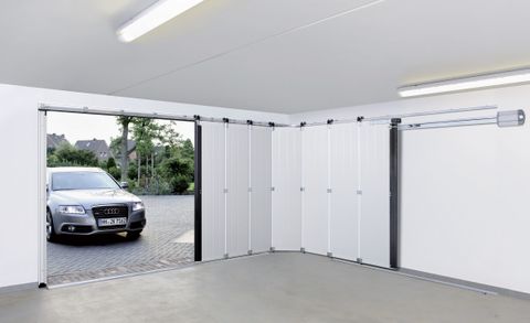 Une comparaison rapide réparation de porte de garage vs installation Quel est le meilleur